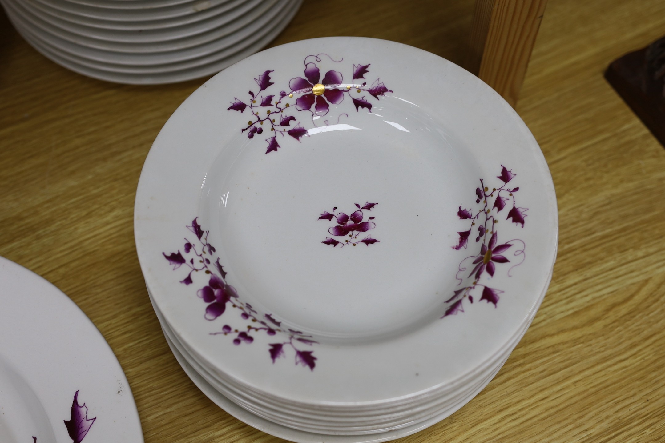 A Flight Barr and Barr floral and gilt decorated part dinner service